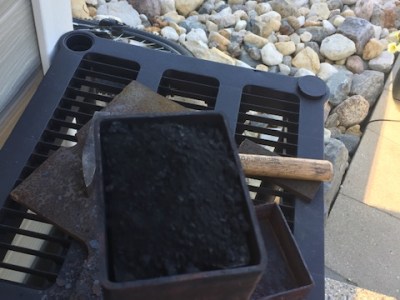 Grinding wood charcoal